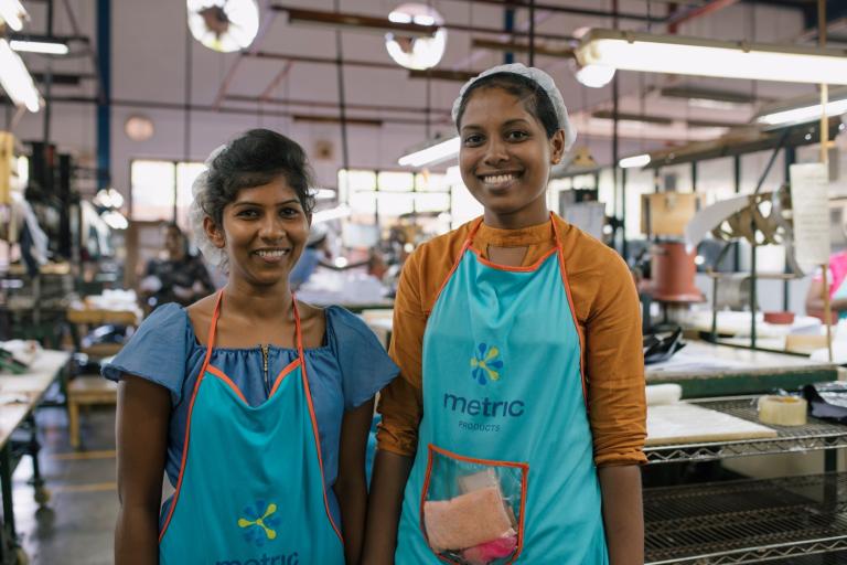 Two women working for metric products